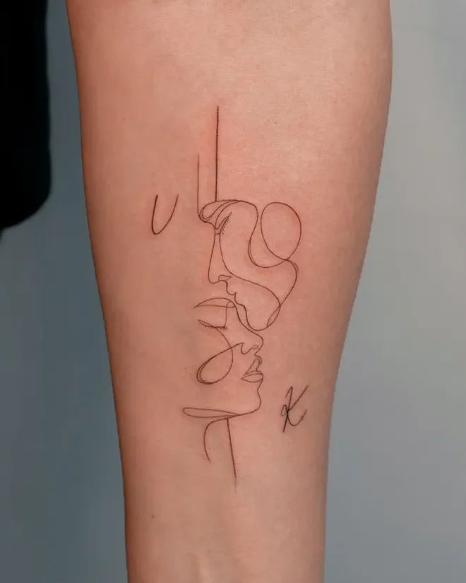 Fine line continuous faces tattoo on the forearm