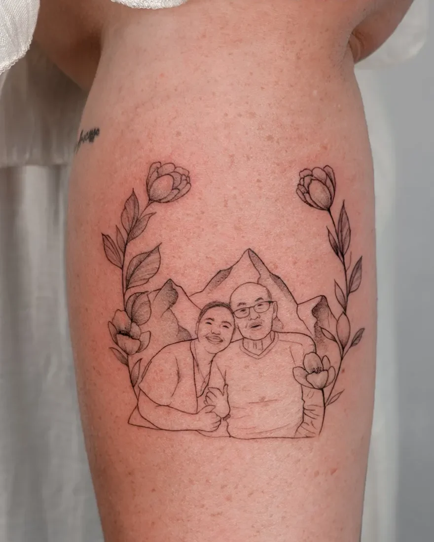 Fine line family portrait with flowers and mountains tattoo on the arm
