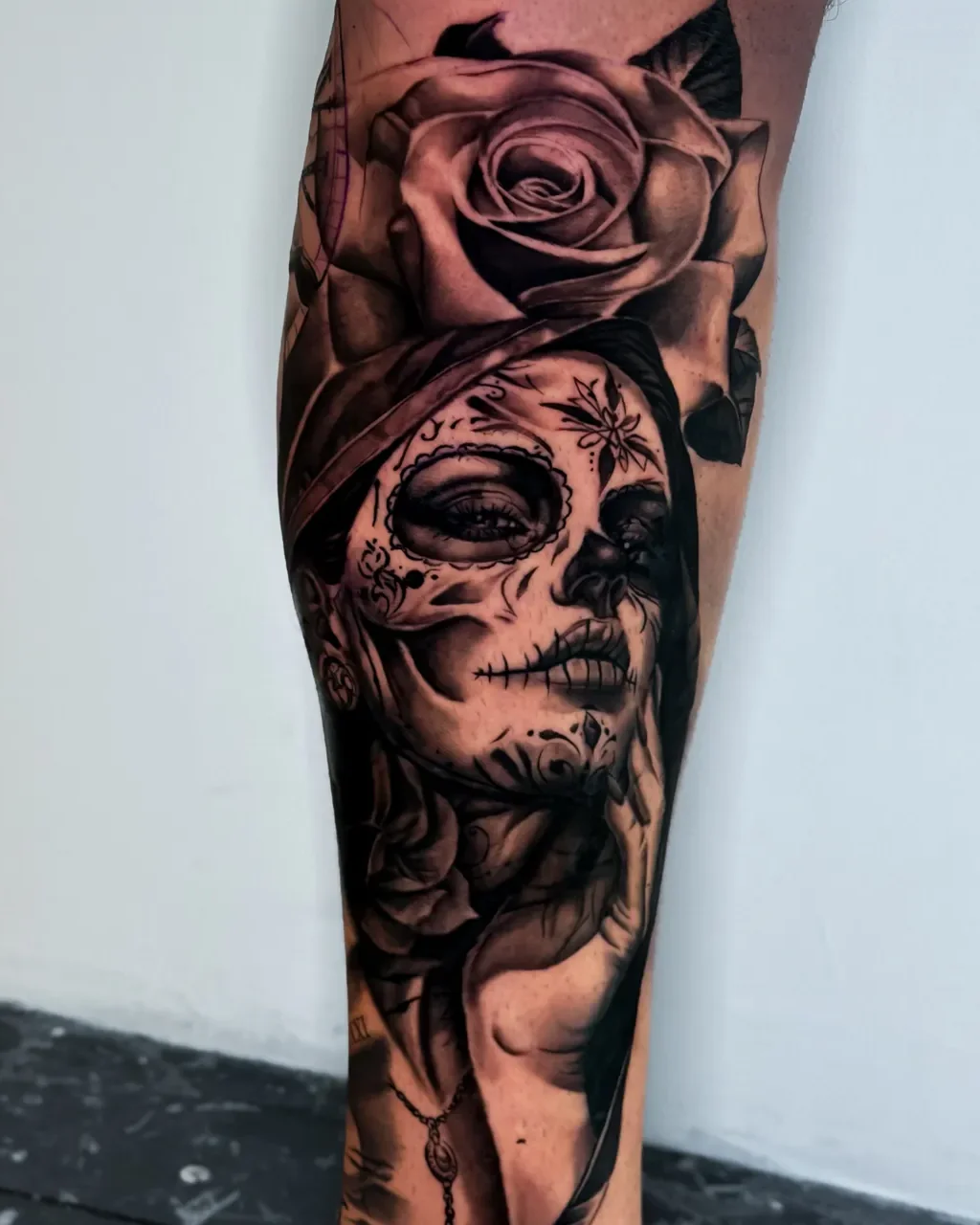 Realism catrina and rose tattoo on the calf