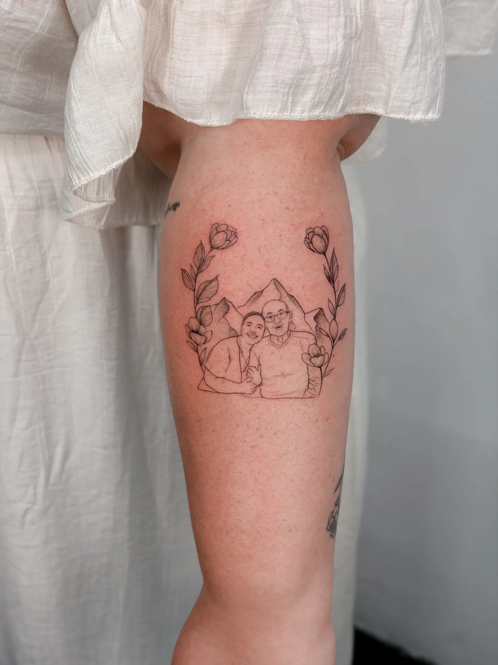 Family portrait with flowers and mountains by Hugo Gonzalez