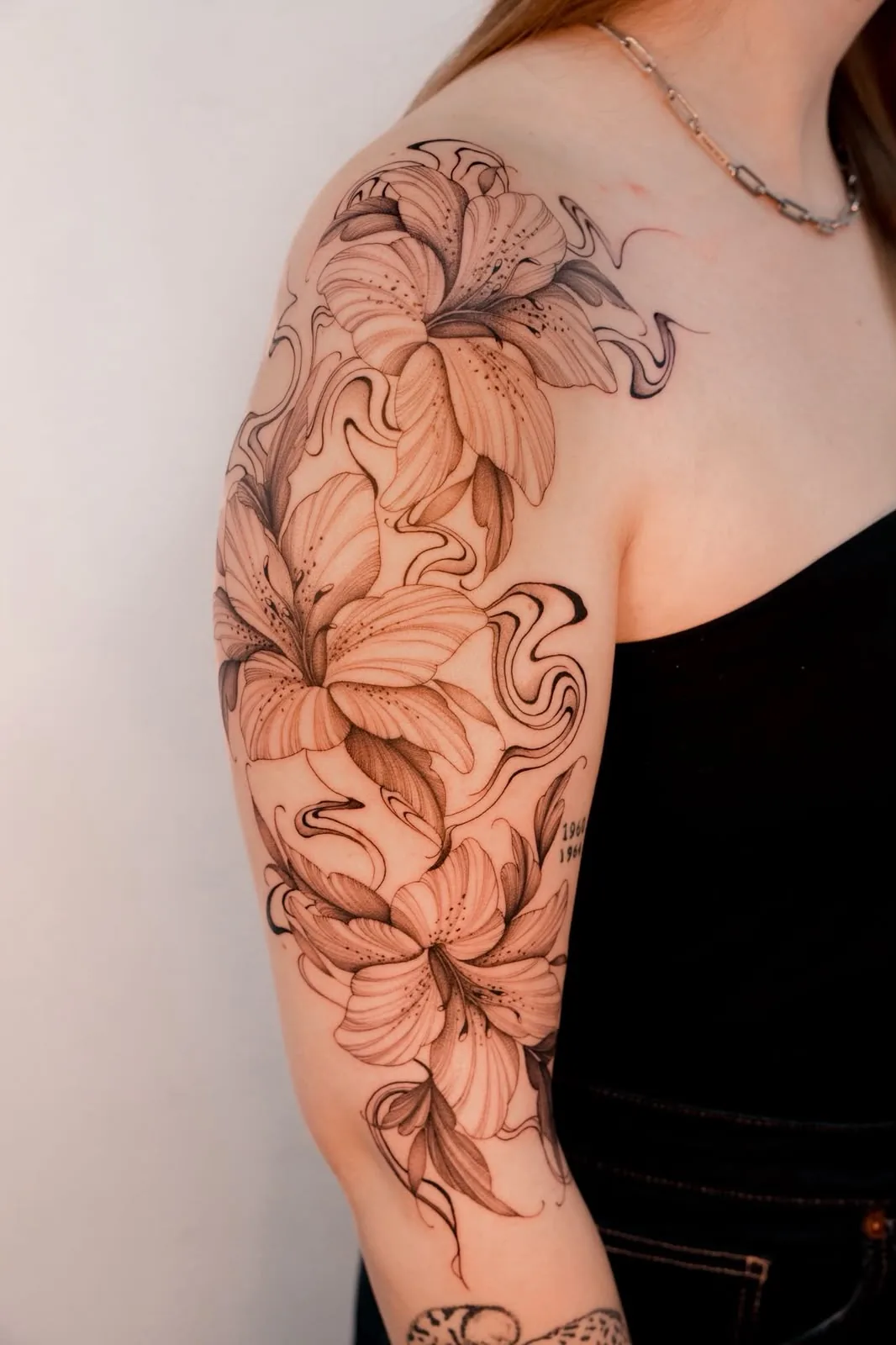 Lilies with smoke — tattoo by Hugo Gonzalez, Funchal, Madeira