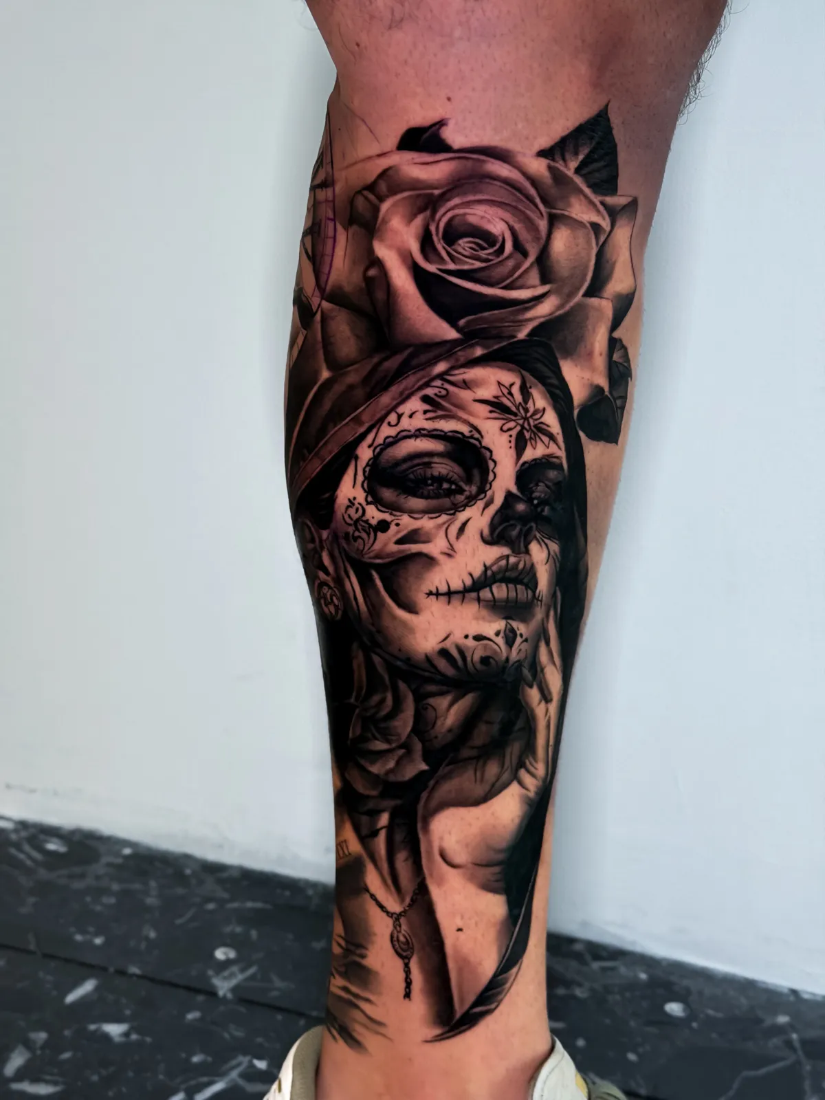 Catrina and rose in black and grey realism by Hugo Gonzalez