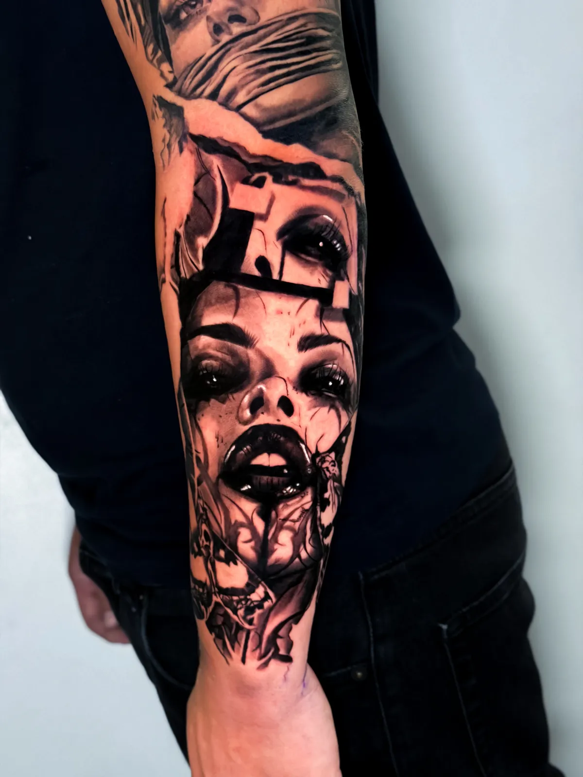 Dark surreal portrait sleeve in black and grey by Hugo Gonzalez